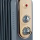 Ariete Linea Vintage 8250 Radiatore a olio Vintage, 7 elementi riscaldanti, 1500W, 3 livelli di potenza, Maniglia e ruote per facile trasporto, Celeste 4