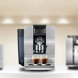 JURA   Due decenni di competenza, esperienza e innovazione nel campo delle macchine automatiche per specialità di caffè